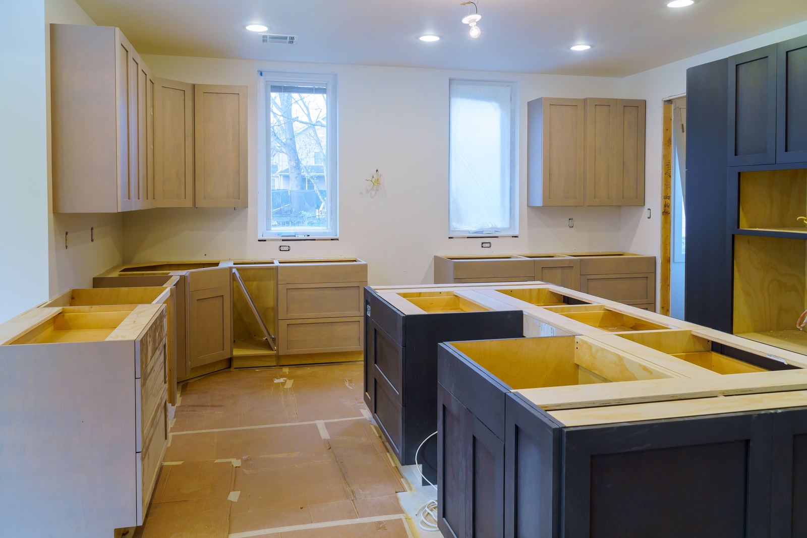 Kitchen remodel with new cabinets and island under construction